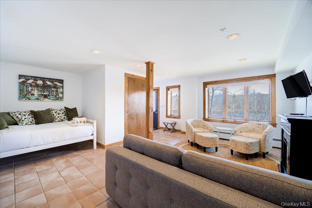 363 Hurd Road, Unit TR48 Bethel, NY 12783 - Photo 25 of 43 Lower Level Family Room