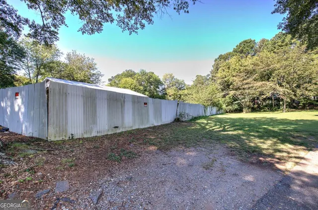 a view of swimming pool with outdoor seating