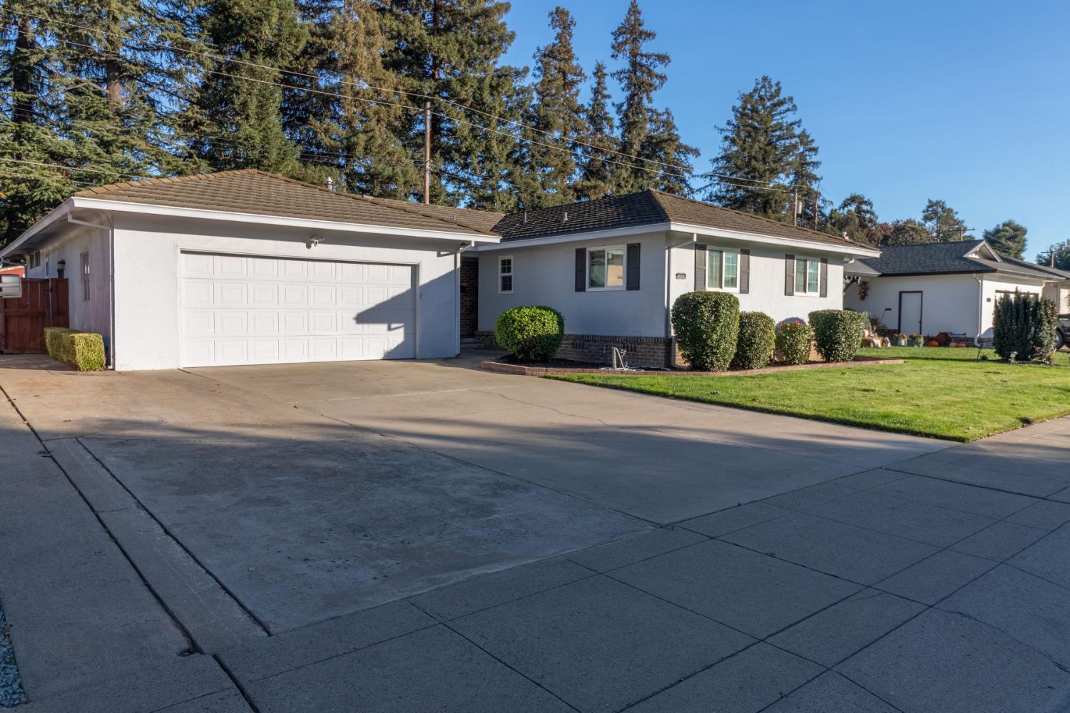 822 South California Street Lodi, CA 95240 - Photo 3 of 34 a view of house with outdoor space and parking