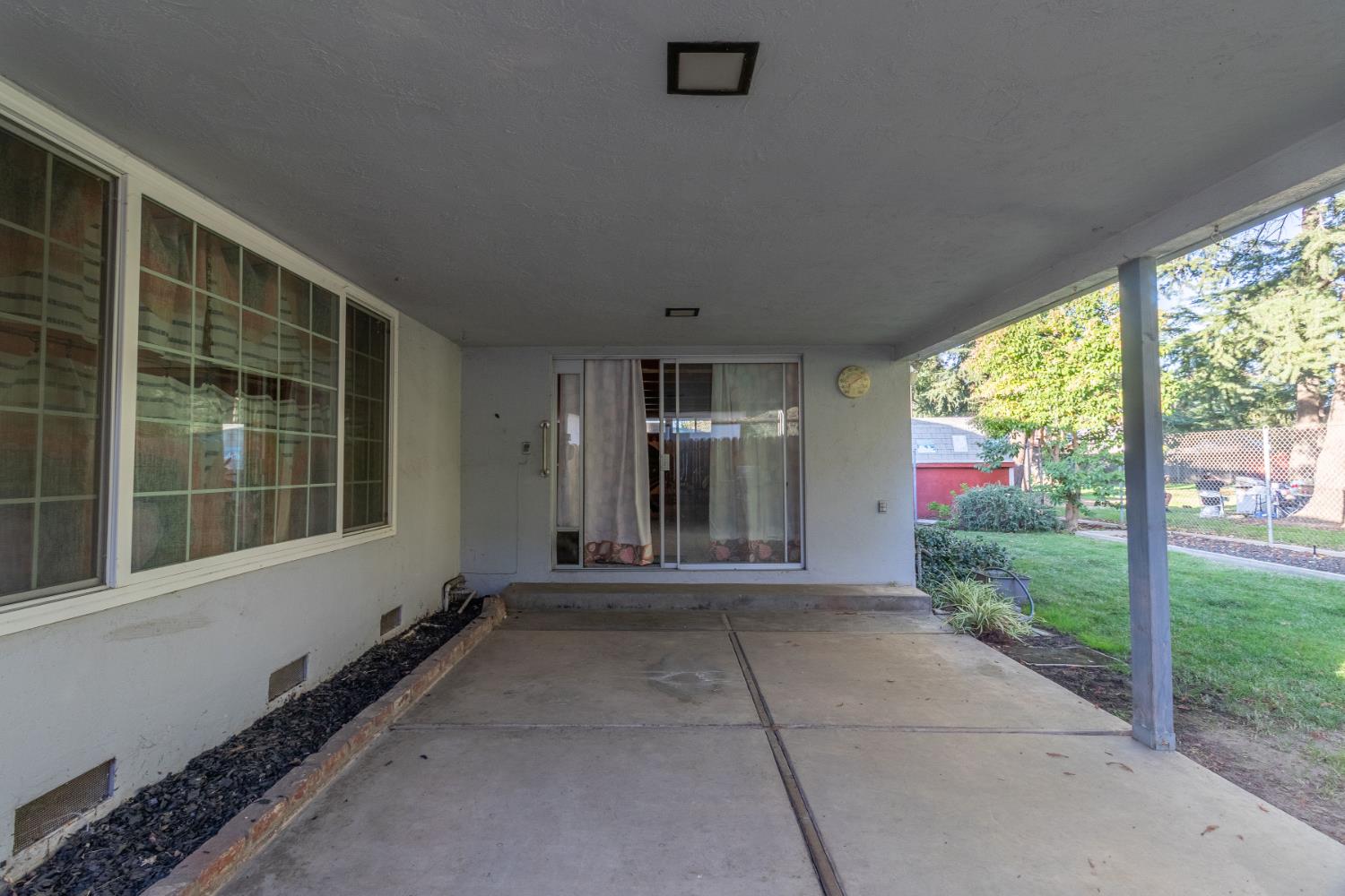 822 South California Street Lodi, CA 95240 - Photo 31 of 34 a front view of a house with a porch