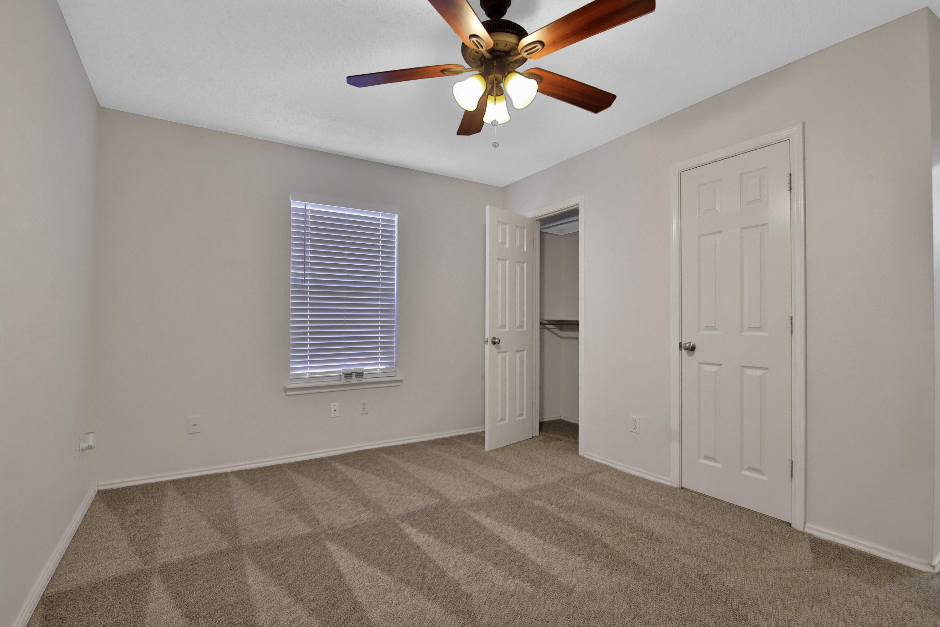 2907 90th Street Lubbock, TX 79423 - Photo 10 of 30 a view of an empty room with a window