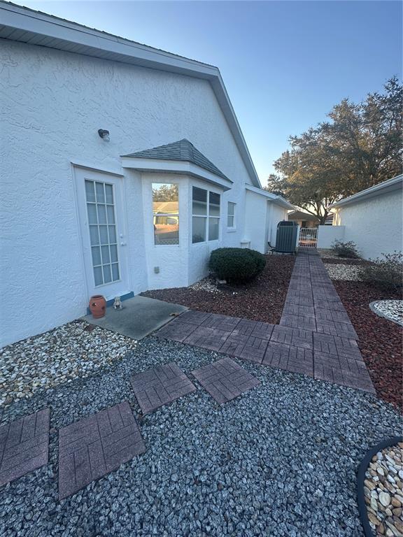 9258 Southwest 91st Circle Ocala, FL 34481 - Photo 22 of 25 a house view with a backyard space