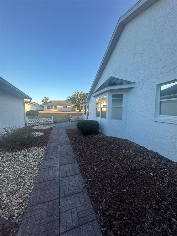 9258 Southwest 91st Circle Ocala, FL 34481 - Photo 23 of 25 a house view with a backyard space