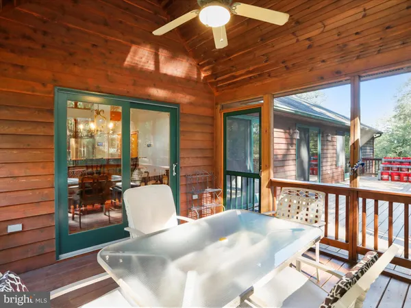 a view of a chair in wooden deck