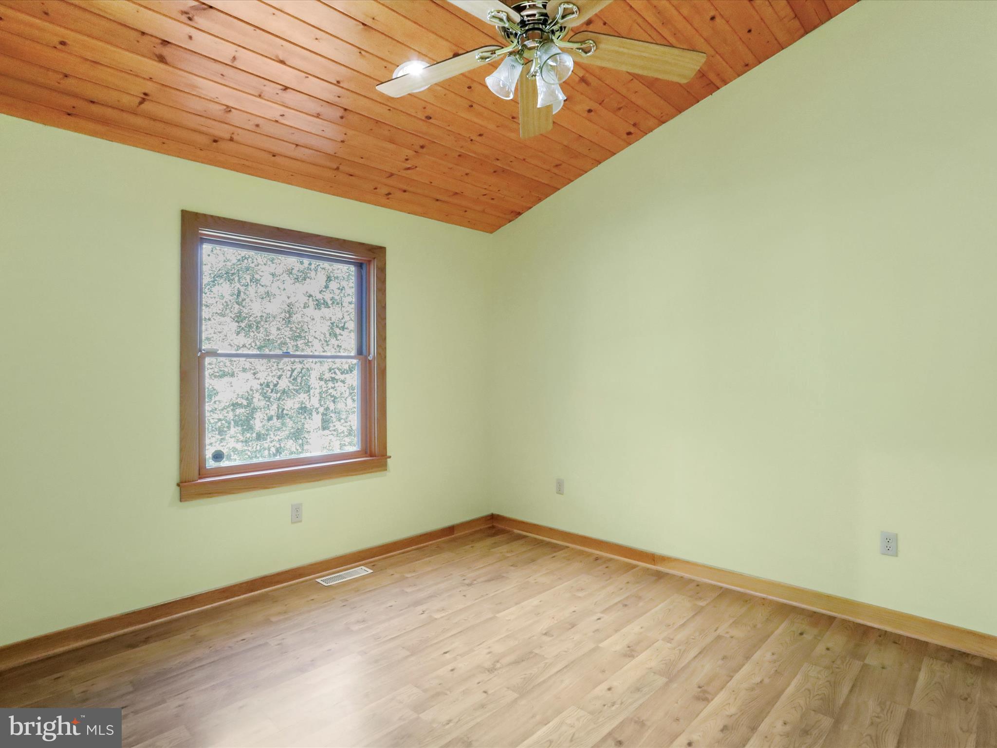 1580 Gaither Road Great Cacapon, WV 25422 - Photo 28 of 65 an empty room with a window