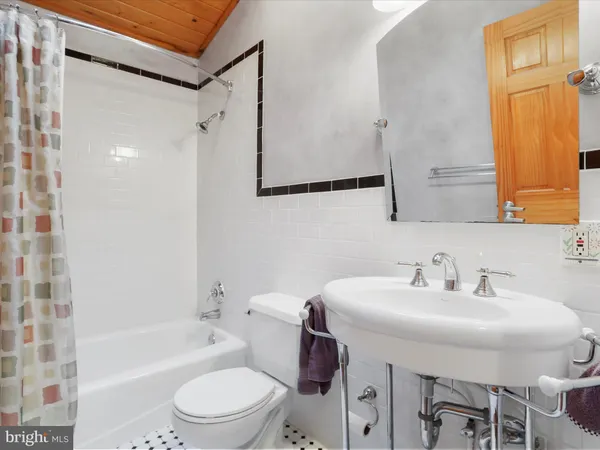 a kitchen with stainless steel appliances granite countertop a refrigerator and a stove