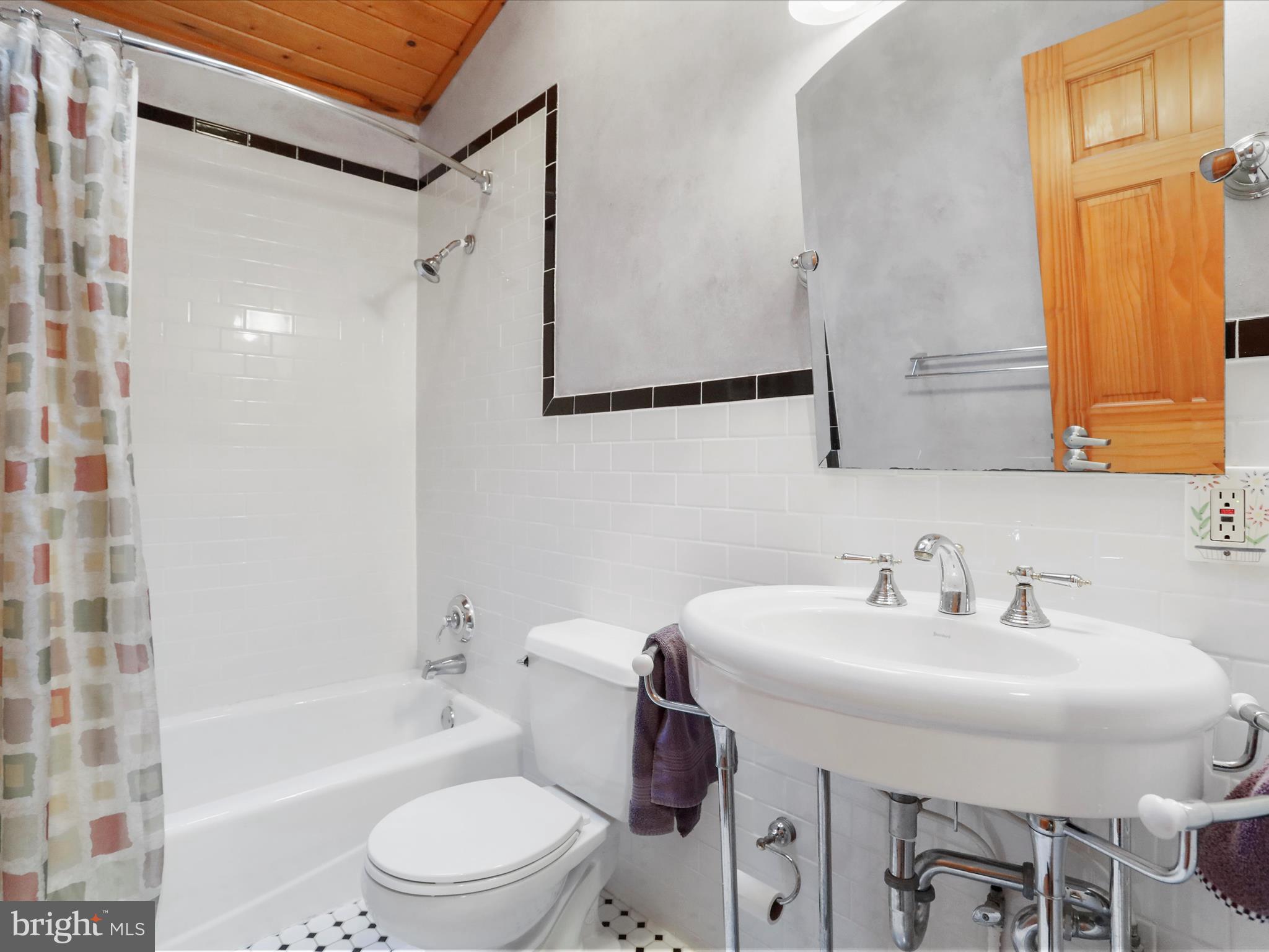 1580 Gaither Road Great Cacapon, WV 25422 - Photo 30 of 65 a bathroom with a sink toilet and shower