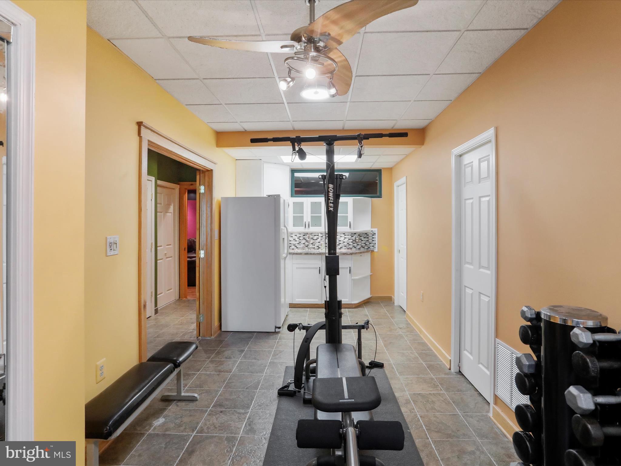 1580 Gaither Road Great Cacapon, WV 25422 - Photo 32 of 65 a view of a room with gym equipment