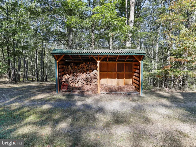 a view of a town with mountains in the background