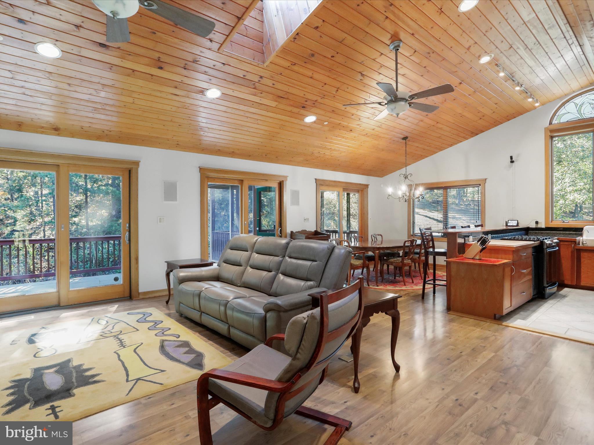 1580 Gaither Road Great Cacapon, WV 25422 - Photo 8 of 65 a living room with furniture kitchen view and a large window