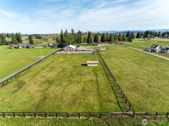 an aerial view of a house with a garden