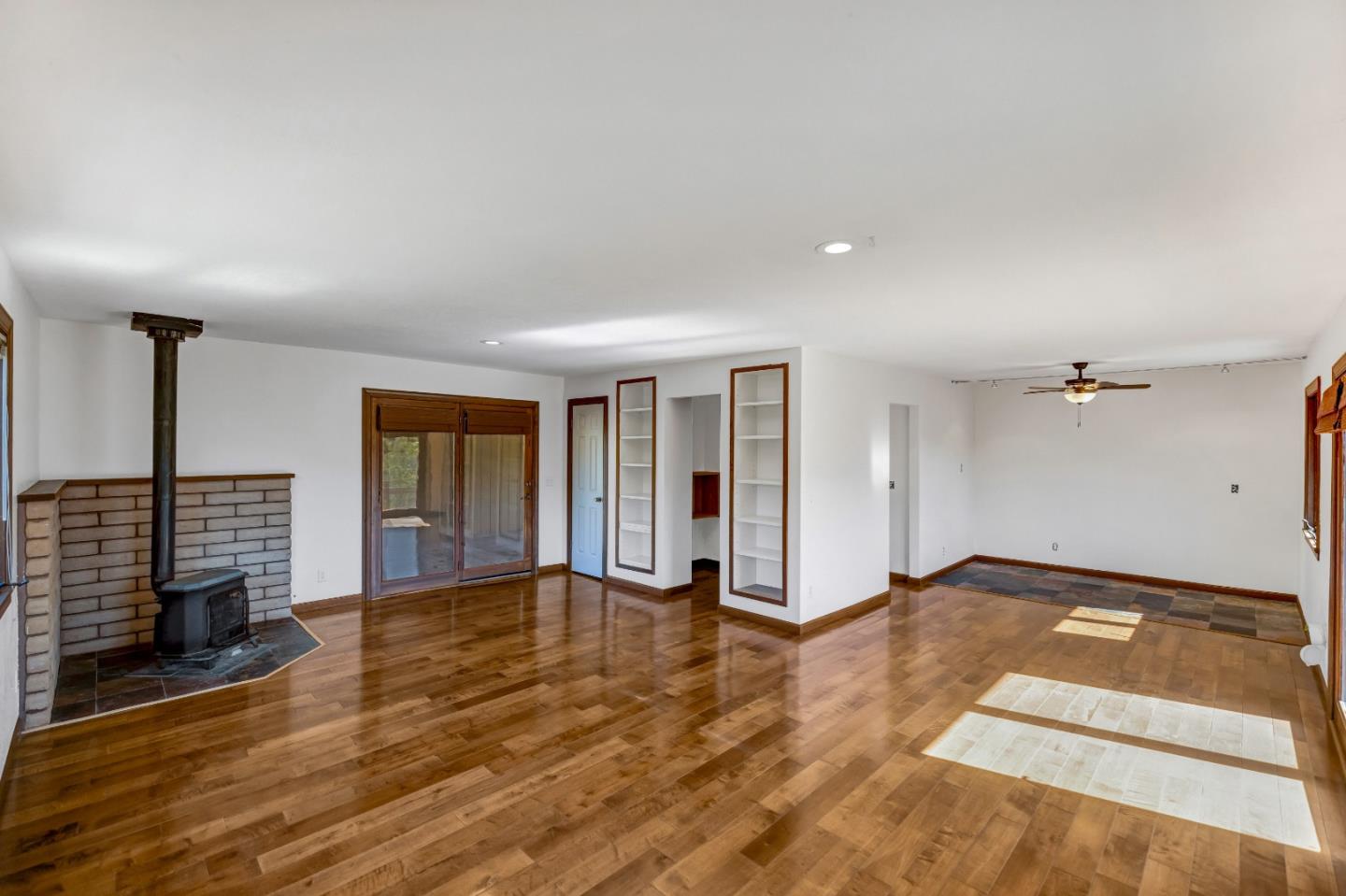274 Corral De Tierra Road Salinas, CA 93908 - Photo 29 of 46 an empty room with wooden floor and windows