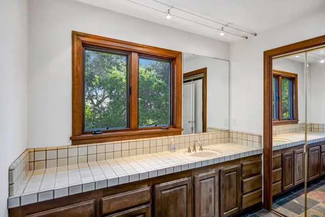 a bathroom with a toilet and a bathtub