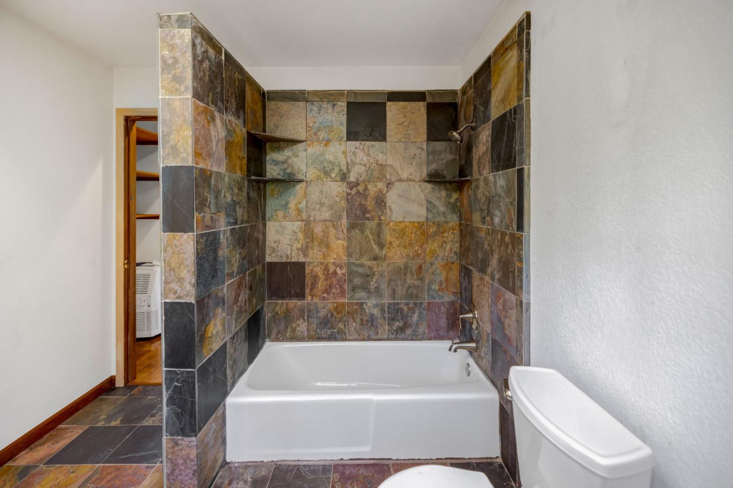 274 Corral De Tierra Road Salinas, CA 93908 - Photo 31 of 46 a bathroom with a toilet and a bathtub