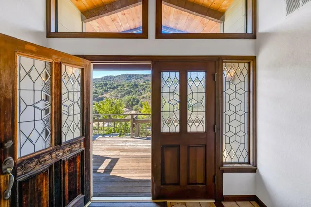 a view of a porch with wooden floor