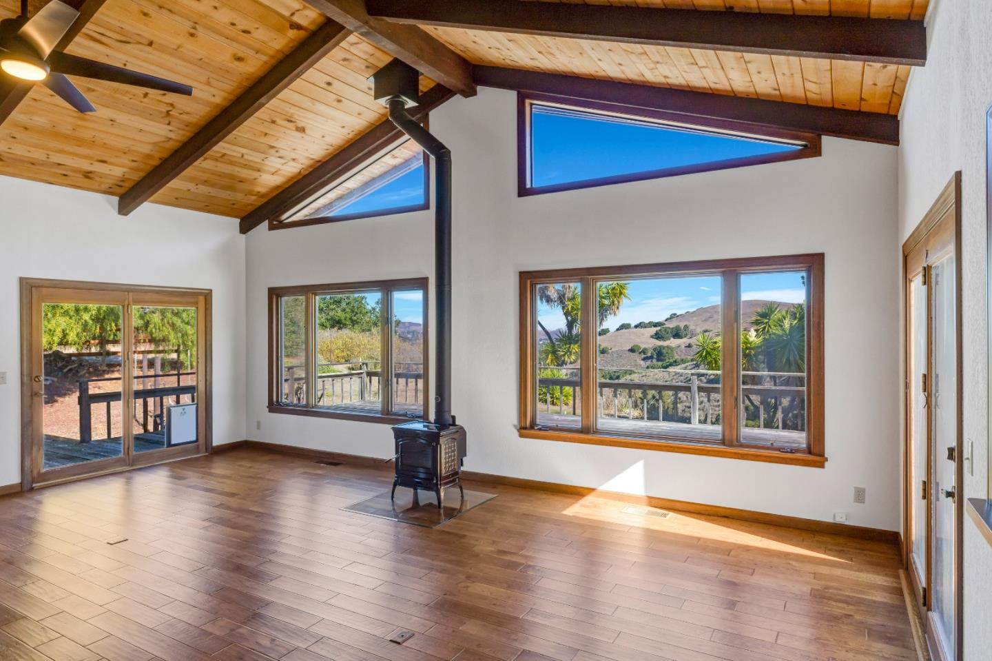 274 Corral De Tierra Road Salinas, CA 93908 - Photo 4 of 46 a view of an empty room with wooden floor and a window