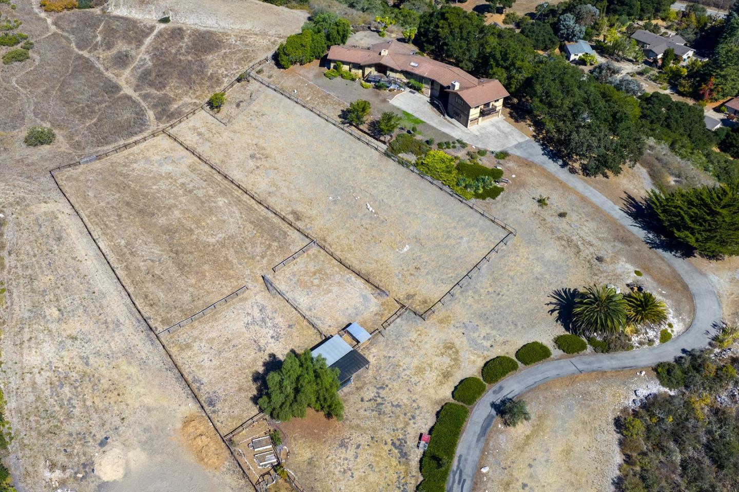 274 Corral De Tierra Road Salinas, CA 93908 - Photo 41 of 46 an aerial view of a house with a yard and a large tree