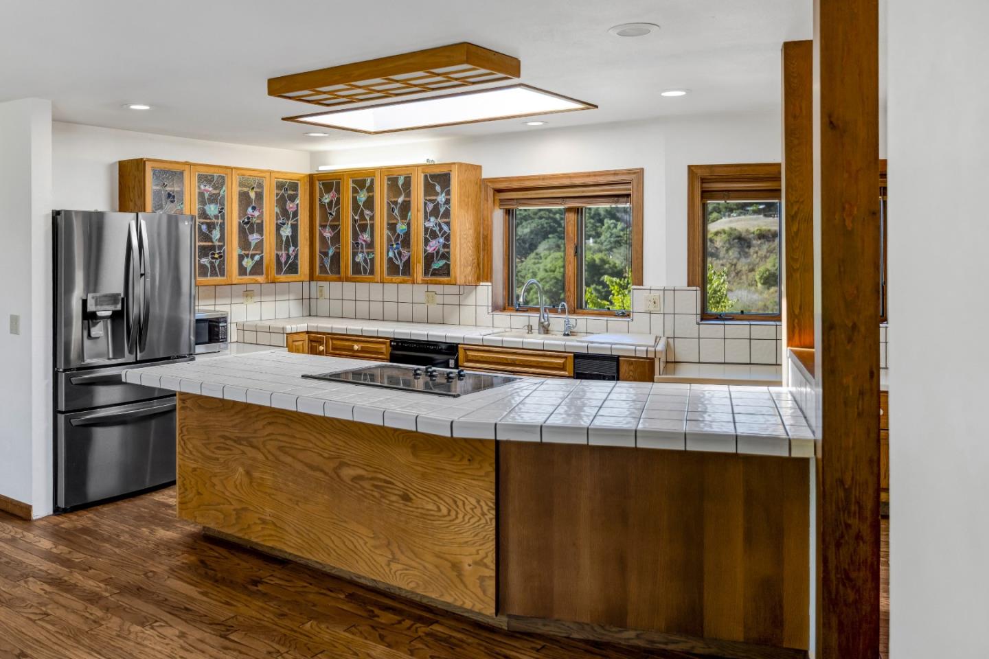274 Corral De Tierra Road Salinas, CA 93908 - Photo 6 of 46 a kitchen with stainless steel appliances granite countertop a refrigerator and a stove