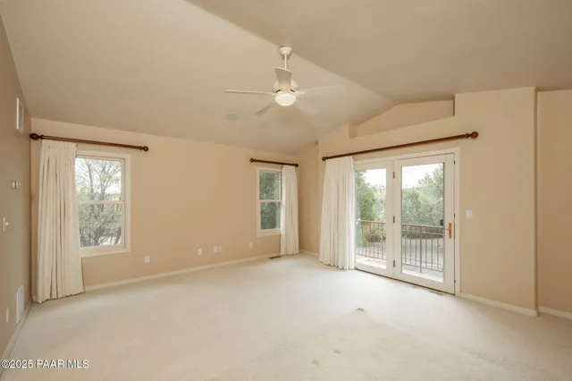 a bathroom with a mirror and a shower