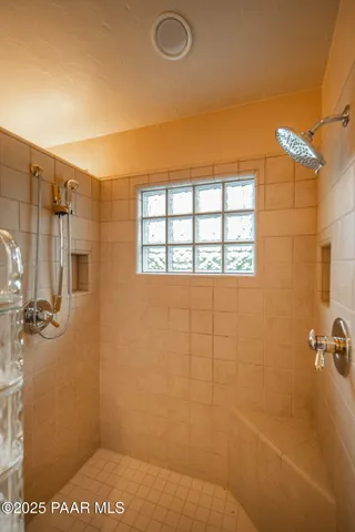 a view of a balcony and trees