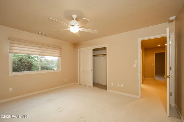 a bathroom with a shower and a sink