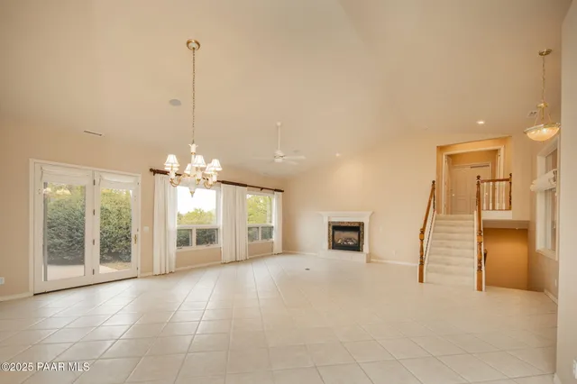 a view of a livingroom with a staircase