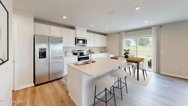 $314,110 | 8040 Sterling Oaks Drive Northwest, Ash, NC 28420