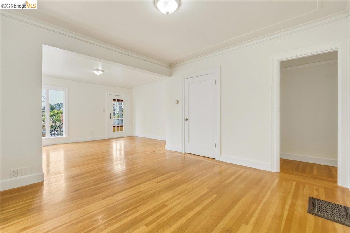 2403 Cedar Street Berkeley, CA 94708 - Photo 23 of 33 Hardwood flooring throughout expansive open room with white walls