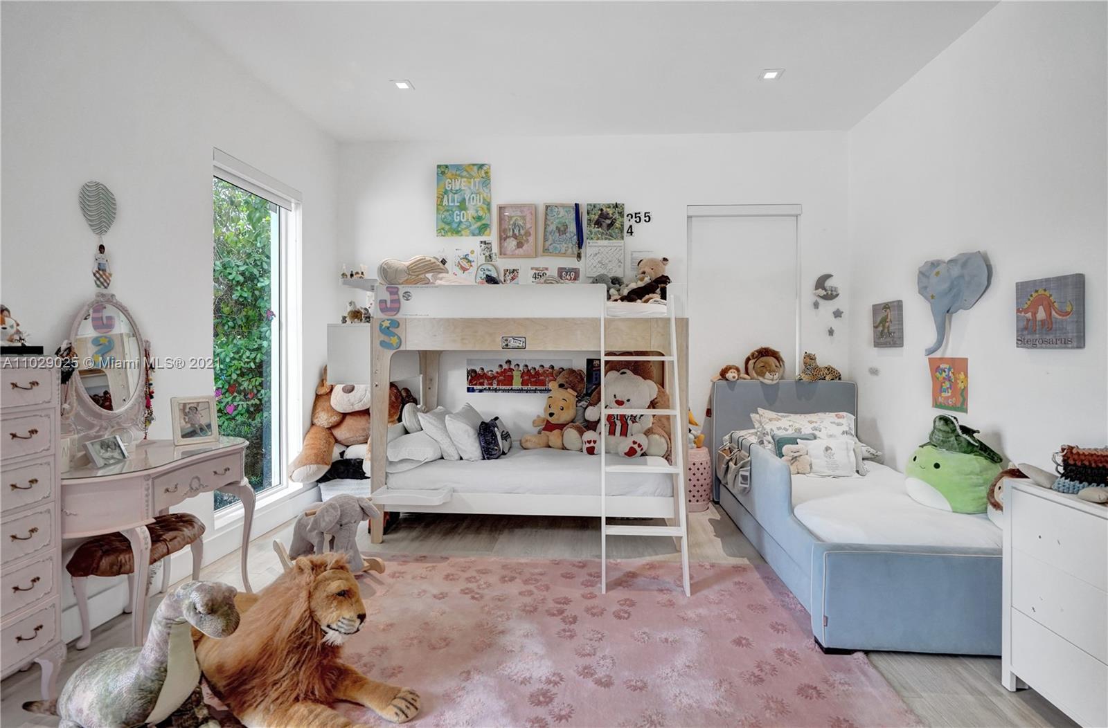 4425 Island Road Miami, FL 33137 - Photo 22 of 30 a living room with furniture and a large window