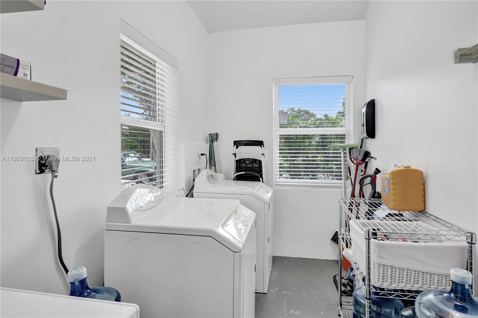 4425 Island Road Miami, FL 33137 - Photo 24 of 30 a room with a couch and a window