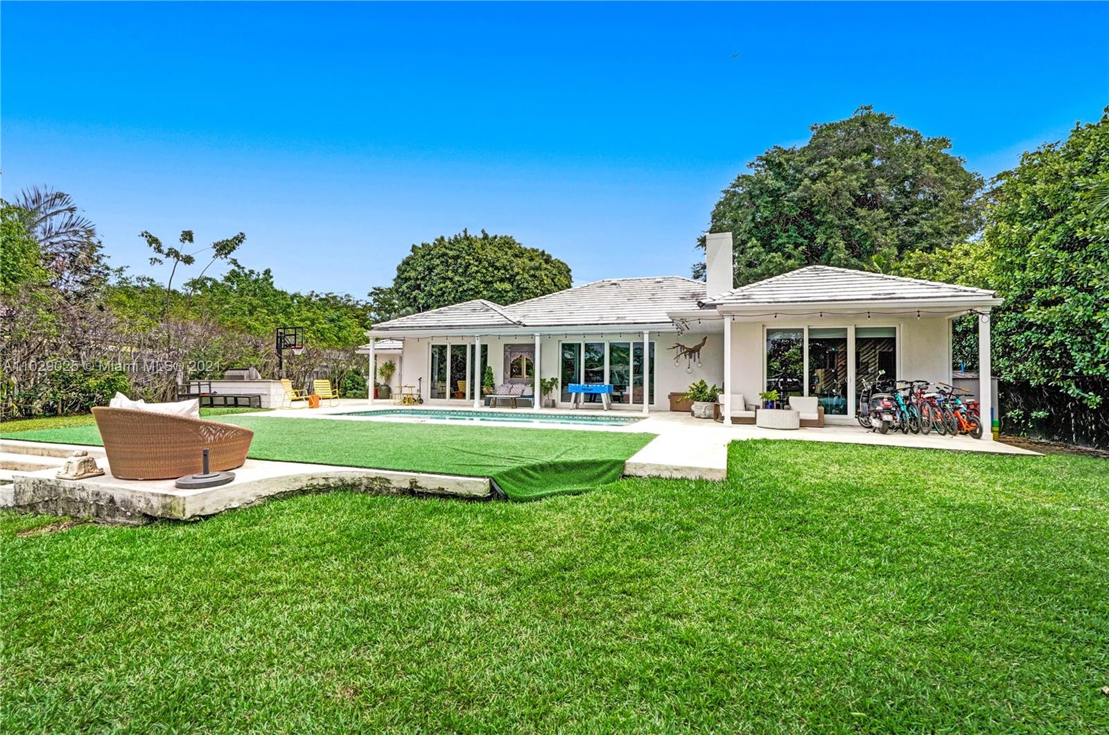 4425 Island Road Miami, FL 33137 - Photo 26 of 30 a front view of a house with a yard
