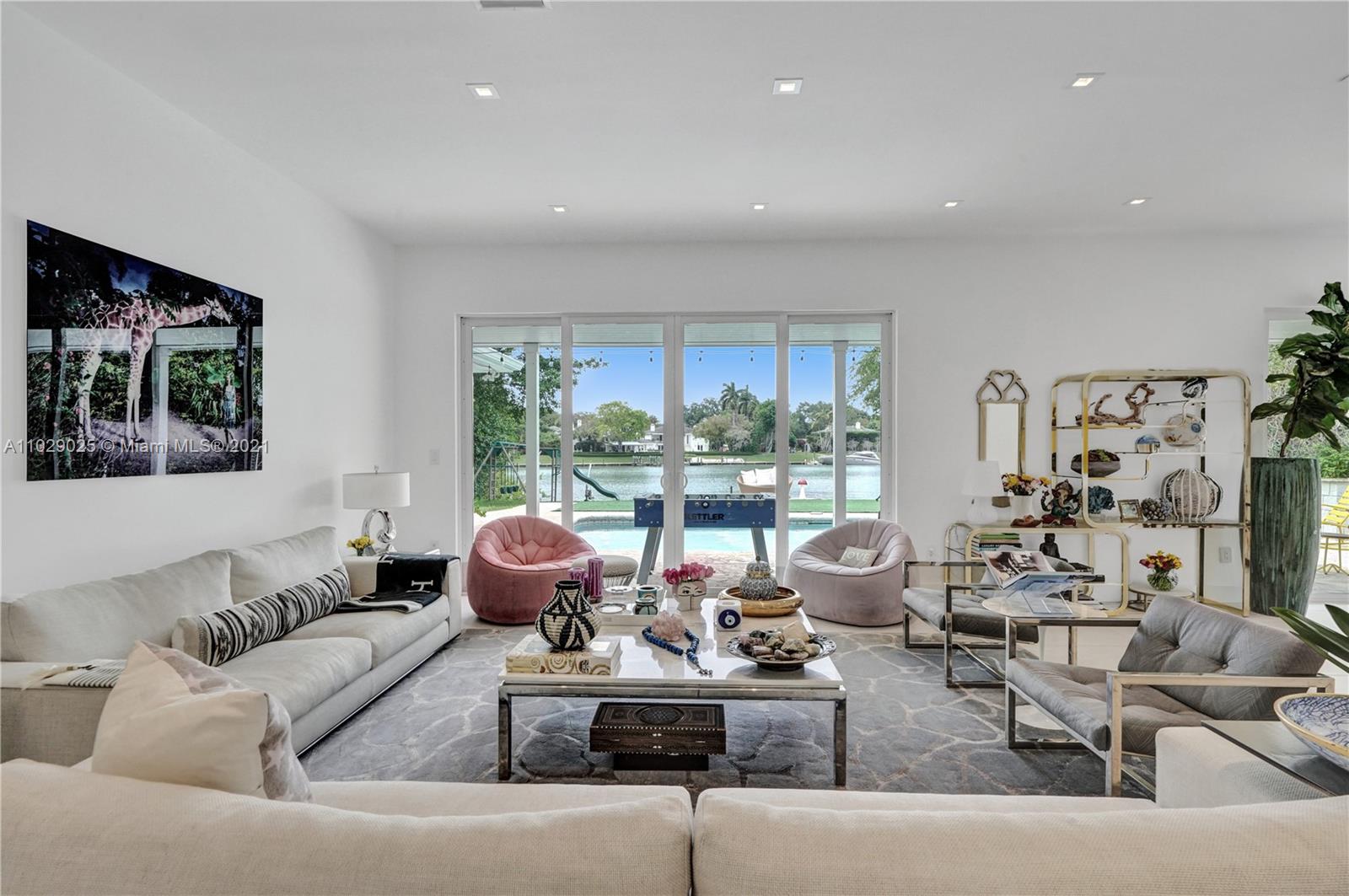 4425 Island Road Miami, FL 33137 - Photo 8 of 30 a living room with furniture and a large window