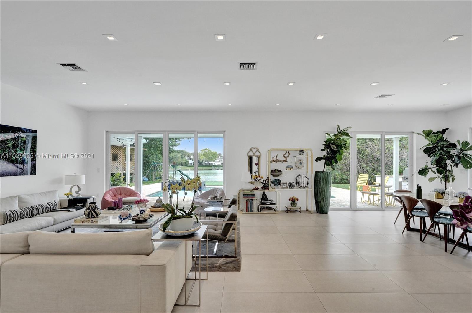 4425 Island Road Miami, FL 33137 - Photo 9 of 30 a living room with furniture and a large window