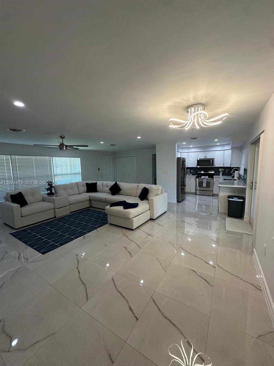 2212 Club House Road North Fort Myers, FL 33917 - Photo 7 of 40 a lobby with furniture and a potted plant