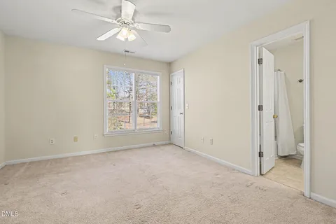 a bathroom with a double vanity sink mirror and vanity