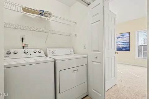 a bathroom with a toilet a sink and a mirror