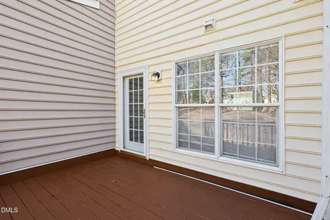 a view of a wooden roof deck