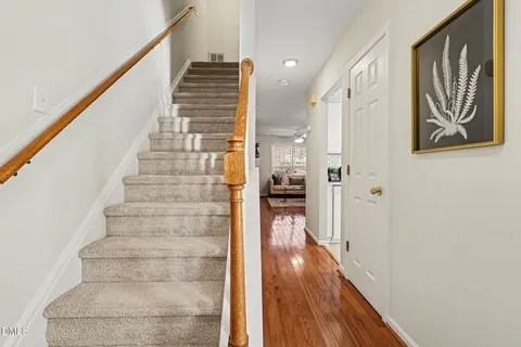 a view of entryway with wooden floor