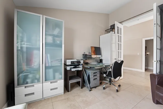 a view of a workspace with furniture