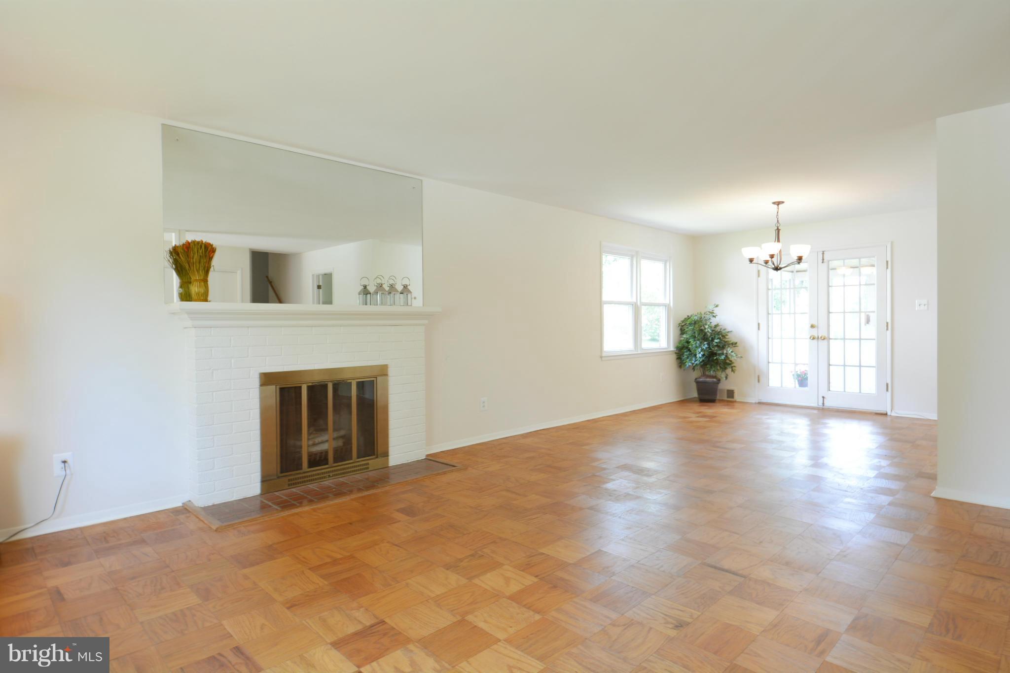 7407 Bath Street Springfield, VA 22150 - Photo 4 of 24 Living Room and Dining Room