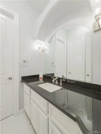 a bathroom with a glass shower