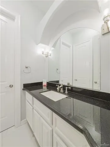 a bathroom with a glass shower