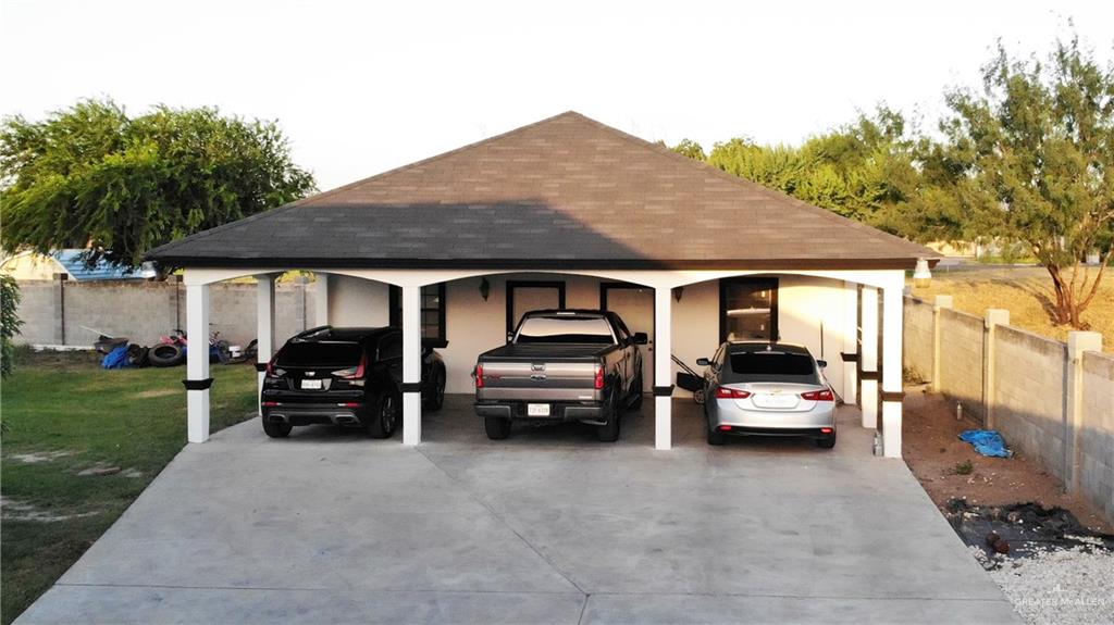 2511 Wisteria Street Rio Grande City, TX 78582 - Photo 25 of 27 a car parked in front of a house