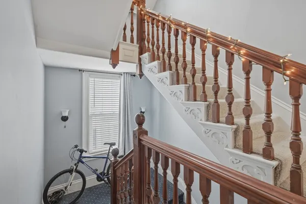 a view of entryway with wooden floor