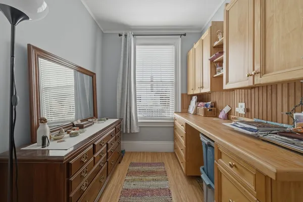a kitchen that has a sink and a stove