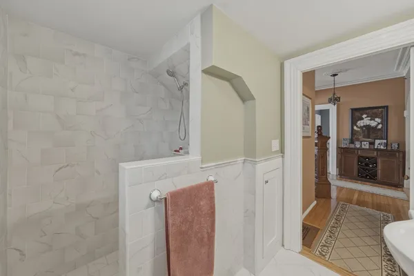 a bathroom with a sink and shower