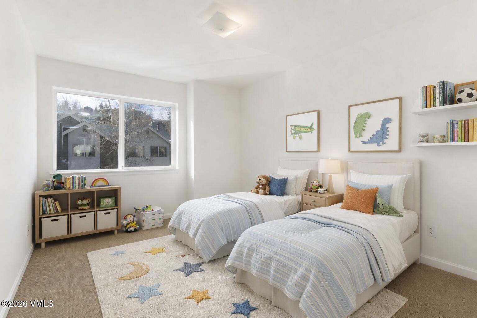 39 Red Tail Drive Edwards, CO 81632 - Photo 21 of 24 a bedroom with two beds and a window