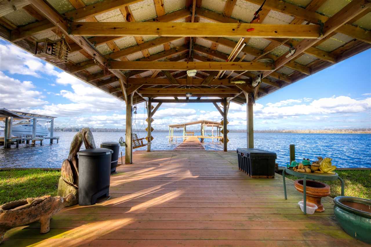 8580 G Palmo Fish Camp Road St. Augustine, FL 32092 - Photo 11 of 48 a view of a terrace with seating area