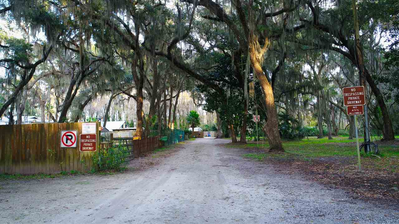 8580 G Palmo Fish Camp Road St. Augustine, FL 32092 - Photo 23 of 48 a view of a park with tree s