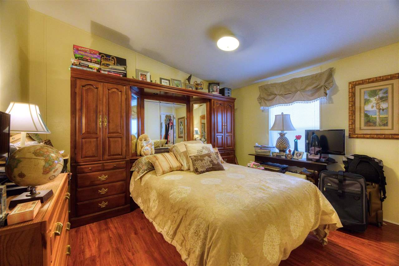 8580 G Palmo Fish Camp Road St. Augustine, FL 32092 - Photo 44 of 48 a bed room with a bed and a television